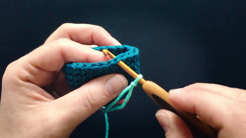 Joining yarn with a standing stitch